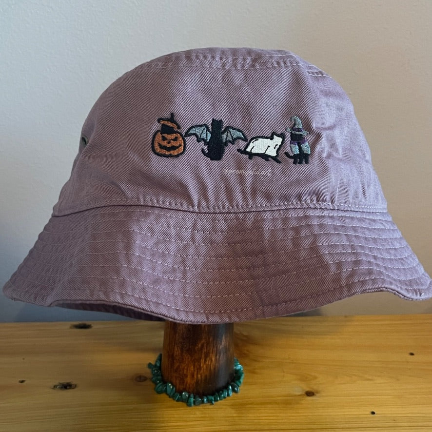 halloween cats on a mauve bucket hat